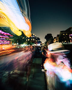 time lapse photo of people and vehicles thumbnail
