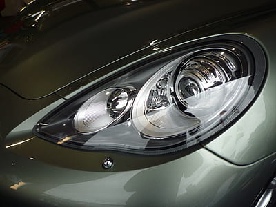 gray vehicle with turned-off headlight thumbnail