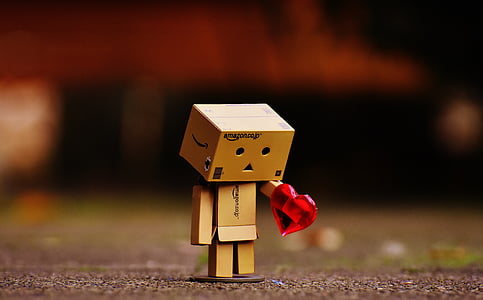 wood block character holding heart thumbnail