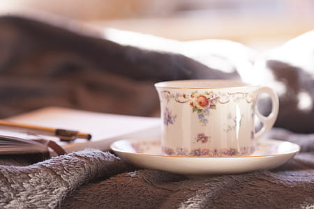 Close-Up Photo of Teacup And Saucer thumbnail