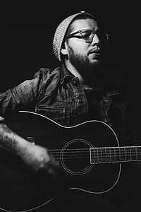 man playing guitar thumbnail
