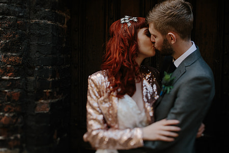 selective focus photography of couple kissing thumbnail