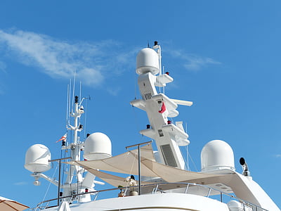 white antenna under clear blue sky thumbnail