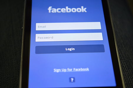 black Android smartphone displaying Facebook application thumbnail