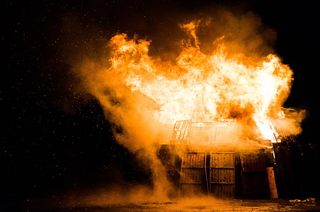 photography of burning house at nighttime thumbnail