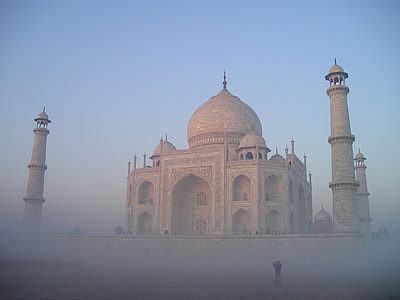 beige concrete mosque with four pillars during daytime thumbnail