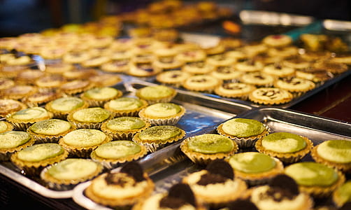 tarts placed in trays close-up photo thumbnail