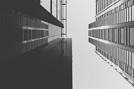 grayscale photography of gray buildings thumbnail