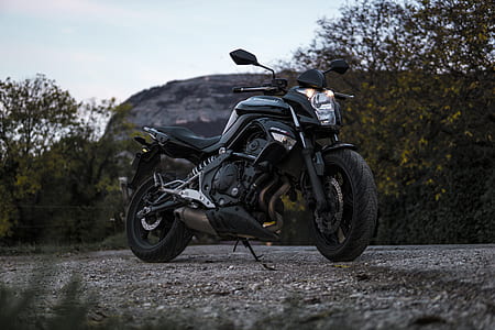 selective focus photo of black naked motorcycle thumbnail