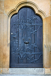 closed black wooden door thumbnail