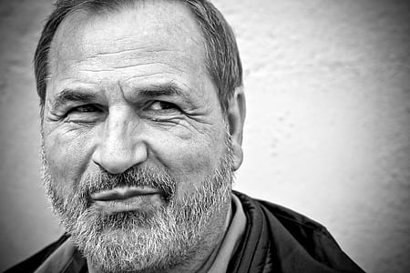 man in grayscale photo thumbnail