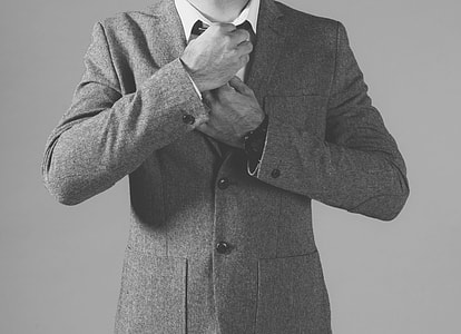 person wearing notched lapel suit jacket thumbnail