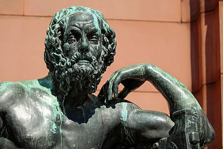 man with hand on shoulder statue thumbnail