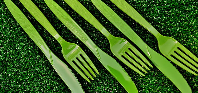 three green plastic forks and bread knives thumbnail