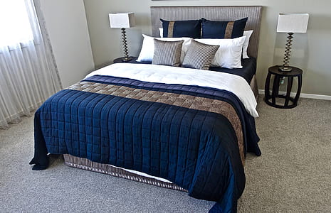 blue mattress and gray bed frame thumbnail
