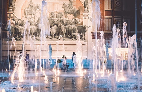 Man Proposing to Woman on Water Fountain Display thumbnail