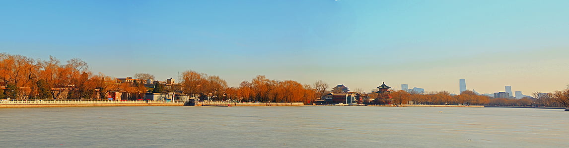 house beside body of water during daytime thumbnail