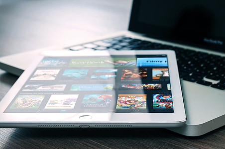 white iPad Pro on MacBook Pro thumbnail