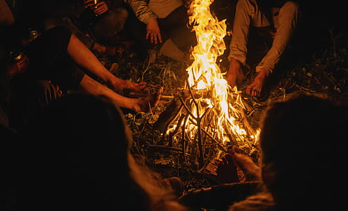 people gathering within bonfire thumbnail