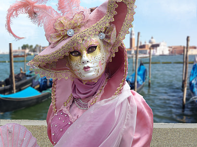 woman in pink Elizabeth collar dress near body of water thumbnail