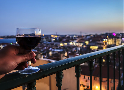 person holding champagne glass thumbnail