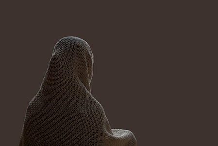 person wearing grey robe thumbnail