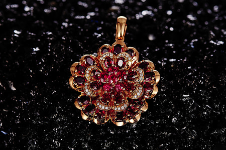 gold-colored red gemstone encrusted pendant thumbnail