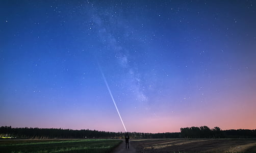man under stary sky thumbnail
