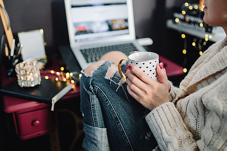 Woman drinking hot tea in her home office thumbnail