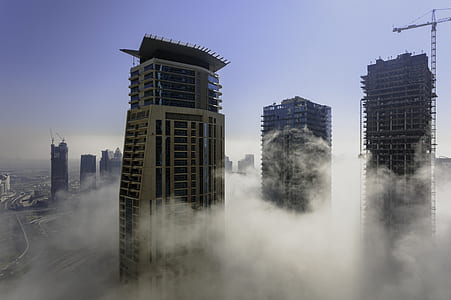 Three Brown High Rise Buildings thumbnail