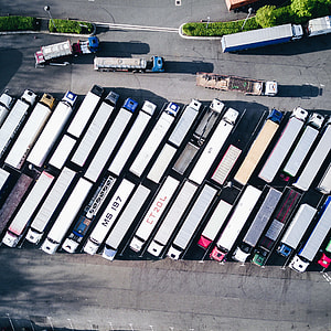 aerial photography of vehicles parallel parking thumbnail