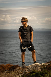 Man Standing On Rock thumbnail