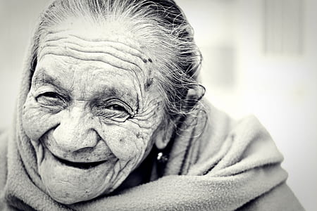 greyscale photo of woman smiling thumbnail