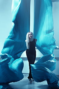 woman wearing black sleeveless dress thumbnail
