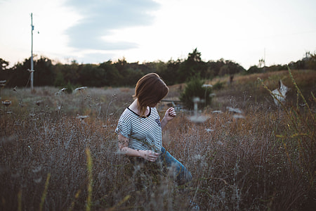 woman in white and black T-shirt thumbnail
