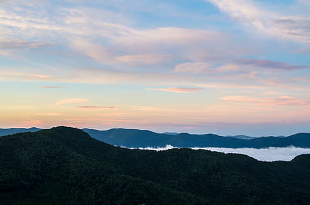 mountain range under sky thumbnail