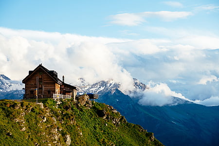 brown house on top of mountain thumbnail