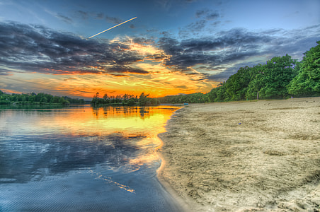 shore and surrounded by trees thumbnail