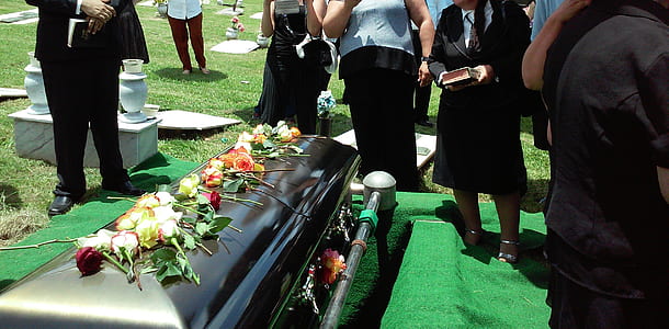 people surrounded casket thumbnail