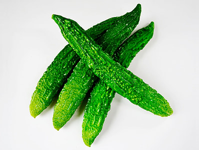 four green bitter gourds thumbnail