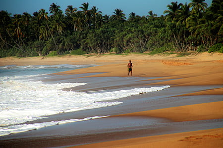 person standing near seashore thumbnail