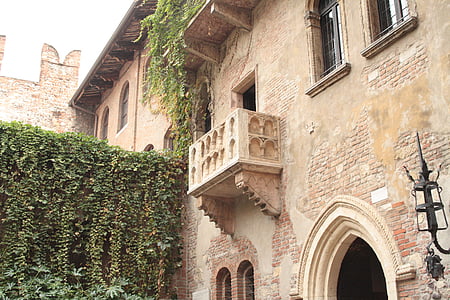 architectural photography of beige stone house thumbnail