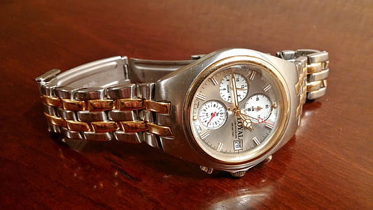 round silver-colored chronograph watch with link bracelet thumbnail