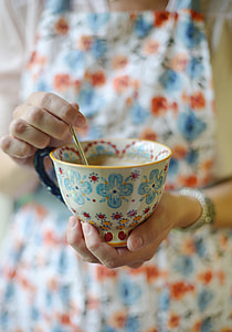 person stirring cup thumbnail