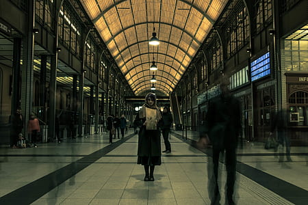 Photography of Woman Wearing Brown Hood thumbnail