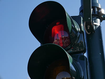 black traffic light on red light thumbnail