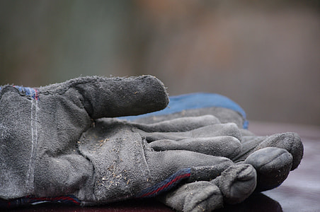 close-up photography of black gloves thumbnail