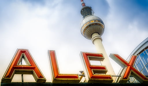 close-up photo of ALEX metal signage near tower thumbnail
