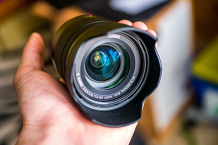 closeup photo of black Lumix camera lens thumbnail