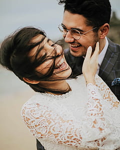 smiling man looking at smiling woman thumbnail